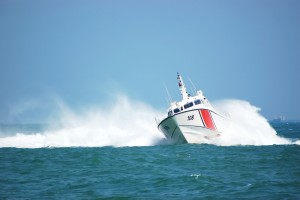 Coast Guard vessel making sharp turn on ocean